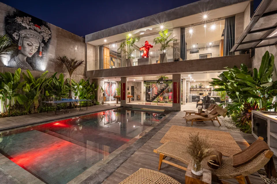 Concrete Serenity at night, one of the three Harmonie villas in Seminyak